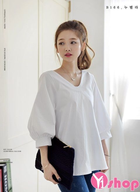Sơ mi nữ tay bồng có thiết kế tay qua cùi chỏ giúp che đi khuyết điểm vai to, vai thô