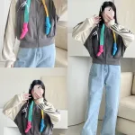 Áo khoác nữ lửng viền sọc phối dây màu cầu vòng bản to