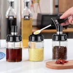 Combo 5 Hũ Đựng Gia Vị Bằng Thuỷ Tinh - Lọ Đựng Gia Vị Thuỷ Tinh Có Nắp Đậy Kèm Thìa Nhà Bếp 13x5cm