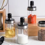 Combo 5 Hũ Đựng Gia Vị Bằng Thuỷ Tinh - Lọ Đựng Gia Vị Thuỷ Tinh Có Nắp Đậy Kèm Thìa Nhà Bếp 13x5cm