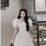 Đầm bố nổi cổ yếm tay phồng oganza