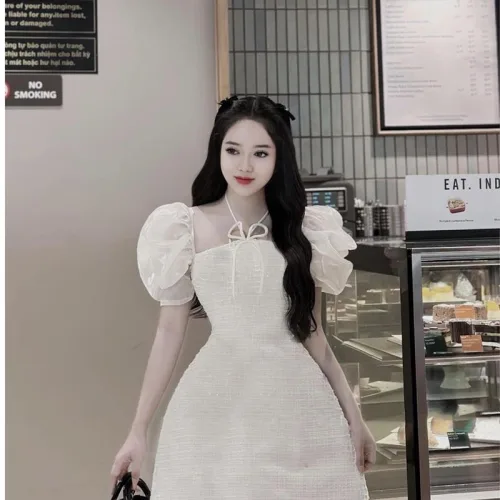 Đầm bố nổi cổ yếm tay phồng oganza
