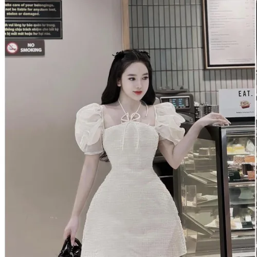 Đầm bố nổi cổ yếm tay phồng oganza