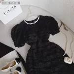 Đầm đen cổ tròn viền đá khoét vai eo
