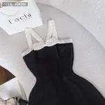Đầm đen dây viền trắng chéo ngực đính đá