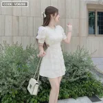 Đầm kem cổ tròn viền đá khoét vai eo