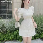Đầm kem cổ tròn viền đá khoét vai eo