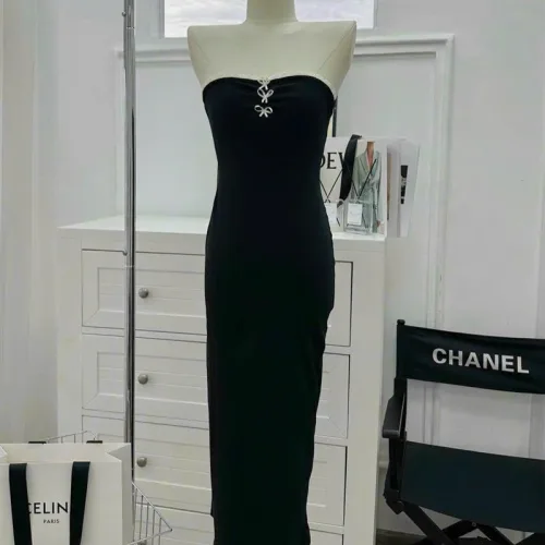 Đầm midi body đen cúp ngực kèm tag nơ