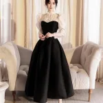 Đầm midi phố voan dây cổ