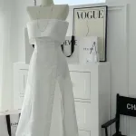Đầm midi trắng cúp ngực trễ vai xẻ lai xoè