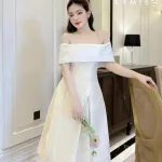Đầm midi trắng cúp ngực trễ vai xẻ lai xoè