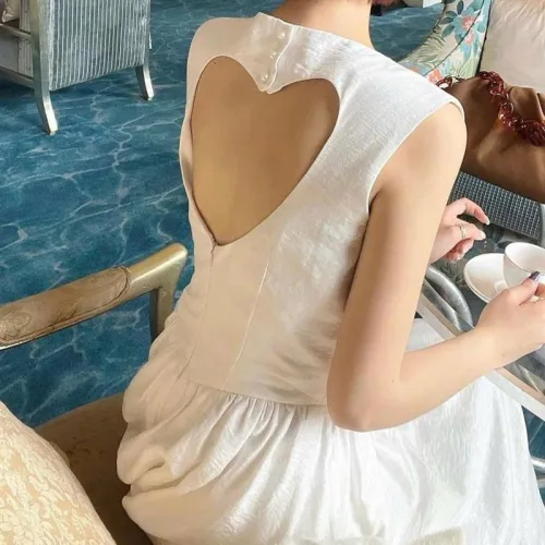 Đầm midi trắng khoét lưng tim