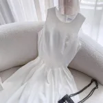 Đầm midi trắng khoét lưng tim