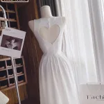 Đầm midi trắng khoét lưng tim