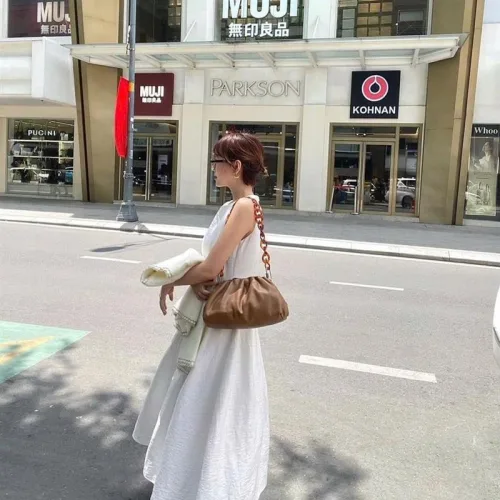 Đầm midi trắng khoét lưng tim