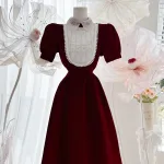 Đầm nhung phối cổ + ngực đính full hạt đá + hoa nổi form dài