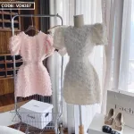 Đầm phối lông vũ cổ tròn viền đá 2 màu