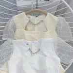 Đầm ren lưới ô cổ viền đá tùng xoè đính hoa ngọc