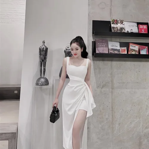 Đầm umi lệch xếp xẻ cao 2 dây