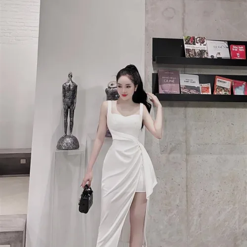 Đầm umi lệch xếp xẻ cao 2 dây