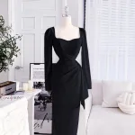 Đầm umi lệch xếp xẻ cao tay dài