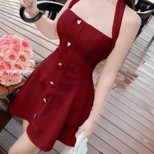 Đầm yếm đính nút trái tim