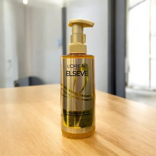 Dầu Xả LorealParis Elseve Extraordinary Oil Smooth Dành Cho Tóc Khô Xoăn 440ml Loreal