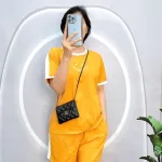 Đồ bộ quần đùi áo tay ngắn cổ tròn in chữ