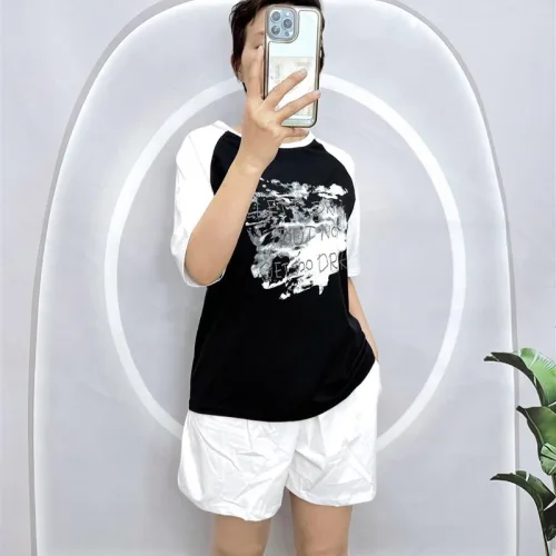 Đồ bộ quần đùi áo tay ngắn cổ tròn in hình