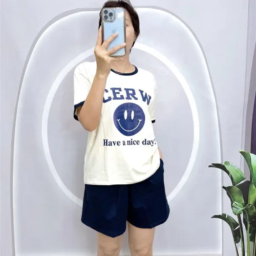 Đồ bộ quần đùi áo tay ngắn cổ tròn in hình mặt cười