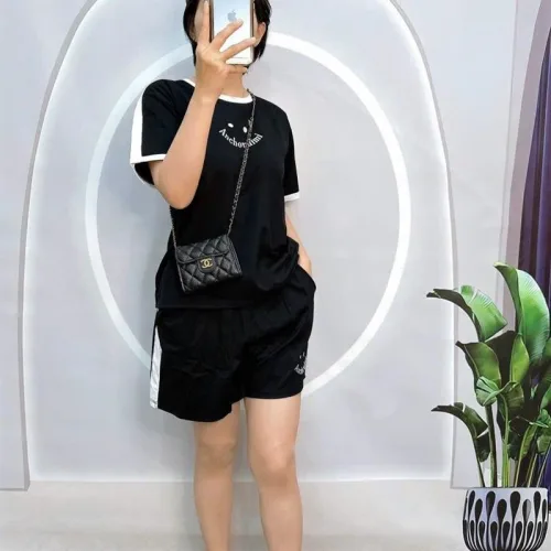 Đồ bộ quần đùi áo tay ngắn cổ tròn in hình mặt cười