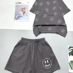 Đồ bộ quần đùi áo tay ngắn in nhiều hình mặt cười