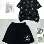 Đồ bộ quần đùi áo tay ngắn in nhiều hình mặt cười