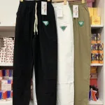 Quần jogger nữ đũi xước kết logo tam giác