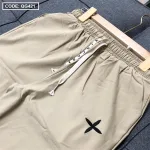 Quần jogger nữ vải đũi xước thêu logo nhiều size