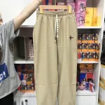Quần jogger nữ vải đũi xước thêu logo nhiều size