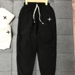 Quần jogger nữ vải đũi xước thêu logo nhiều size