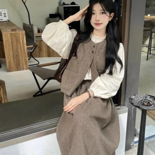 Sét 3 món áo trắng xếp li ngực phối ghi lê nâu túi + chân váy midi