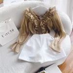 Sét áo nâu viền bèo ngực + short trắng