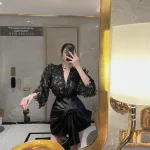 Sét áo thêu bướm nổi + chân váy xếp nơ lệch