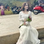 Sét áo trắng cuốn biên cài đá nơ + chân váy midi nude