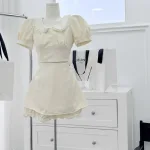 Sét crop nude cổ sen tay búp + chân váy viền ren