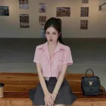 Sét crop sơ mi kẻ + chân váy phối xếp ly
