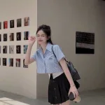Sét crop sơ mi kẻ + chân váy phối xếp ly