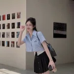 Sét crop sơ mi kẻ + chân váy phối xếp ly
