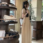 Sét pull nâu cổ tròn rút hông + quần suông xếp ly kèm belt
