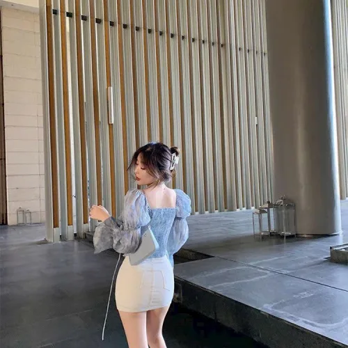 Sét voan hoa xanh viền bèo tay loe + chân váy kaki trắng