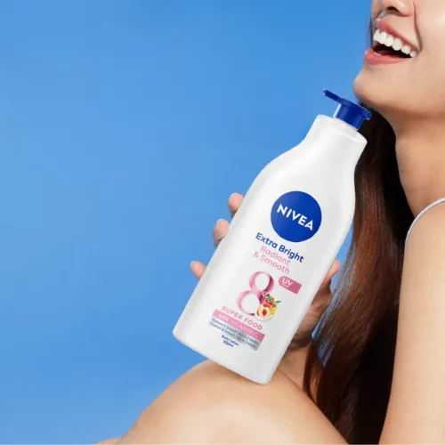 Sữa Dưỡng Thể Nivea Dưỡng Da Sáng Mịn 350ml Màu Hồng - Ban Ngày
